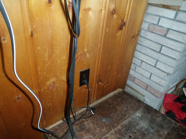 In this photo taken while on a home, cottage or commercial inspection We see an older two pin outlet installed back when home cottage or commercial electrical systems were ungrounded. These two pin ungrounded systems are still commonly  being used in Orillia, Gravenhurst, Bracebridge and Muskoka i the older homes. cottages, and even commercial structures